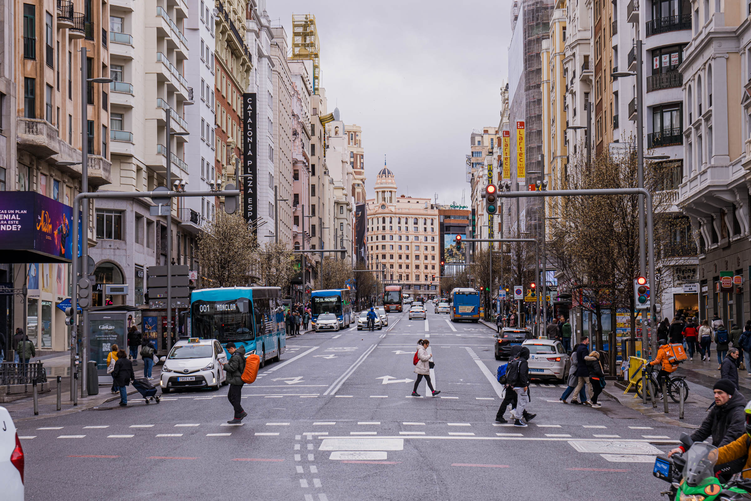 View of Gran Vía with busy streets, clubs, restaurants and theaters. (Madrid, Spain)