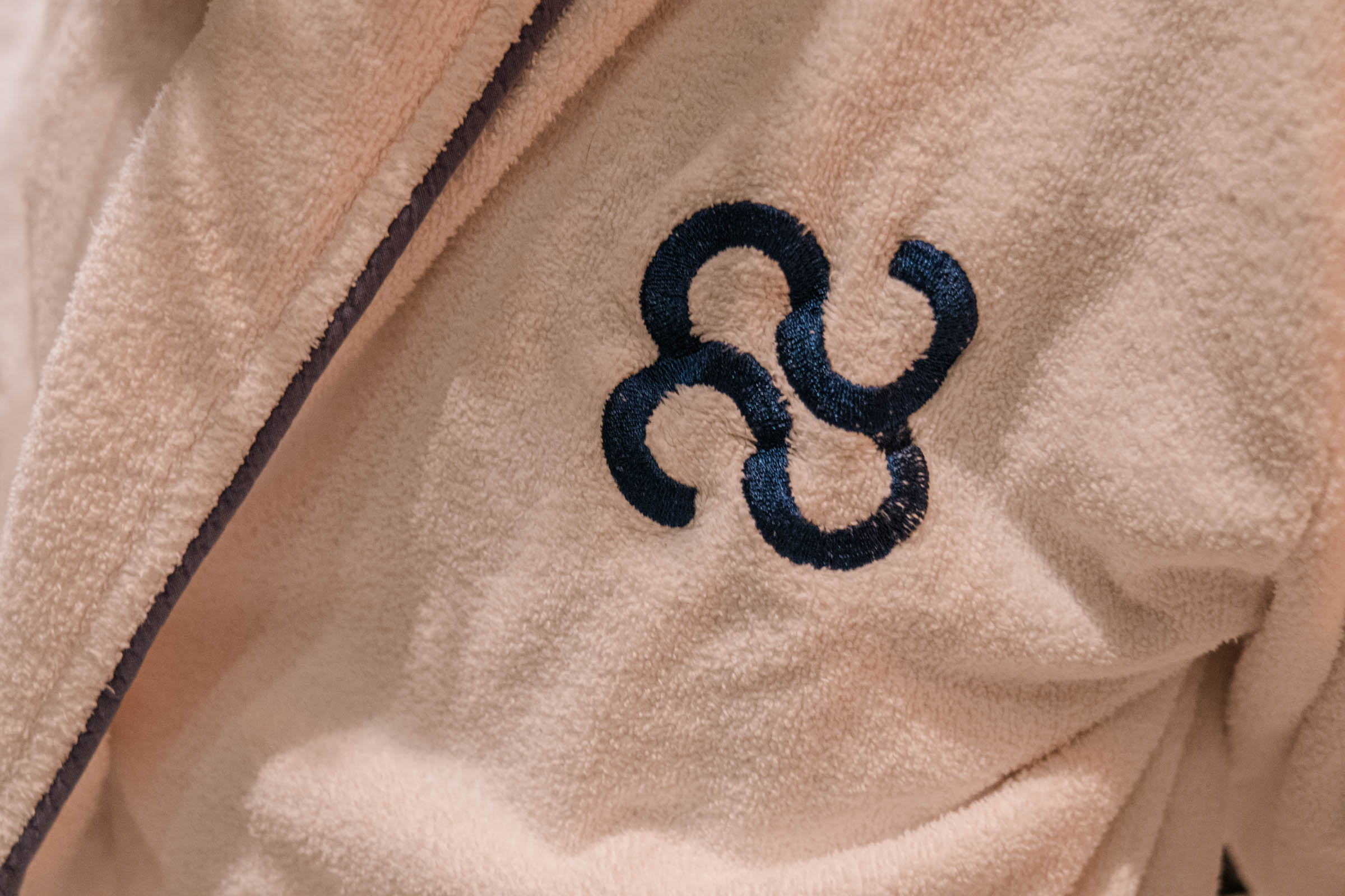 Bathrobe with CoolRooms Palacio de Atocha hotel logo