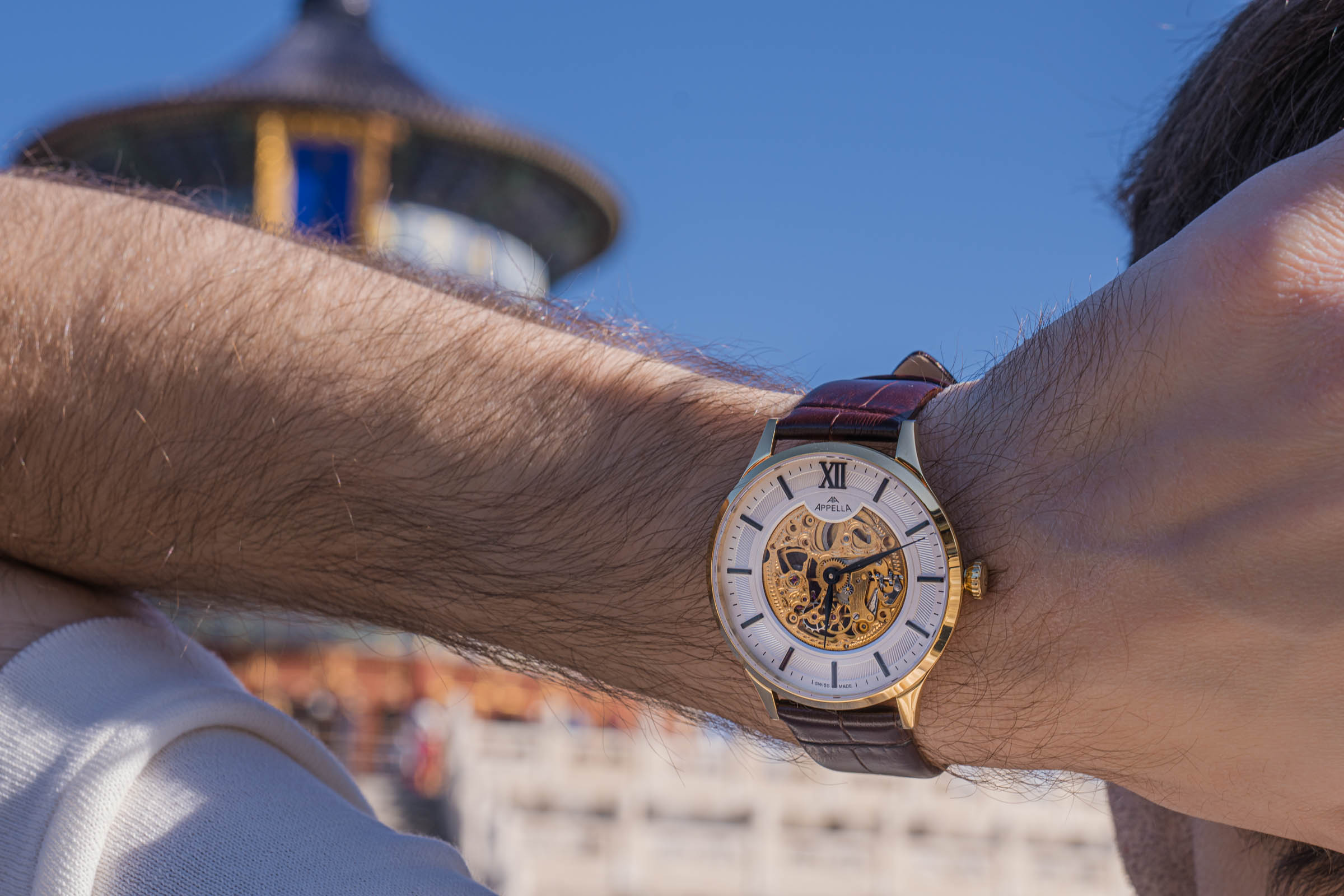 Appella L901B63M Gent collection Swiss watch with sapphire crystal glass paired with Loro Piana beige silk t-shirt detail