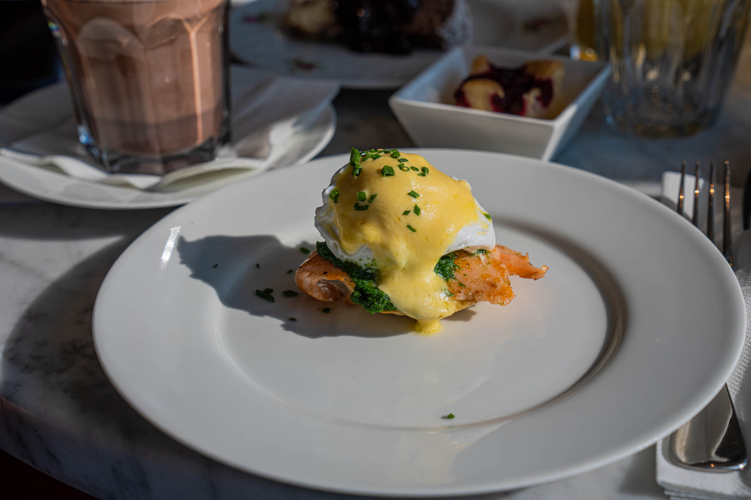 Eggs Benedict with smoked salmon and Viennese hot chocolate, breakfast above the rooftops of Vienna
