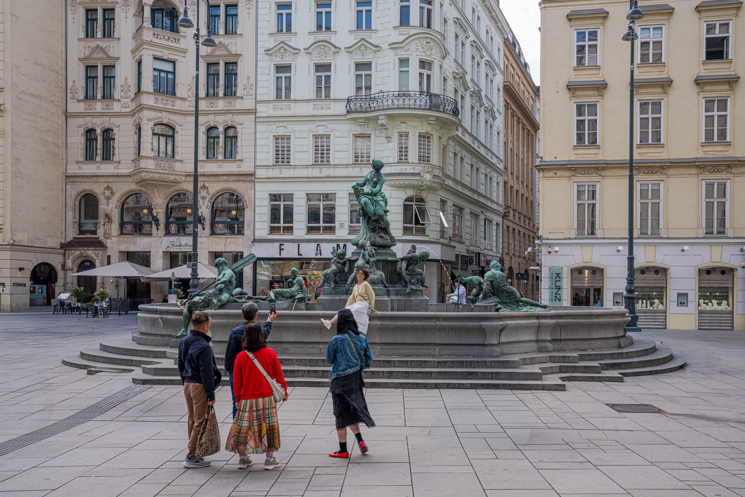 Baroque Donner Fountain on Neuer Markt square in Vienna, Austria, surrounded by historic Viennese architecture