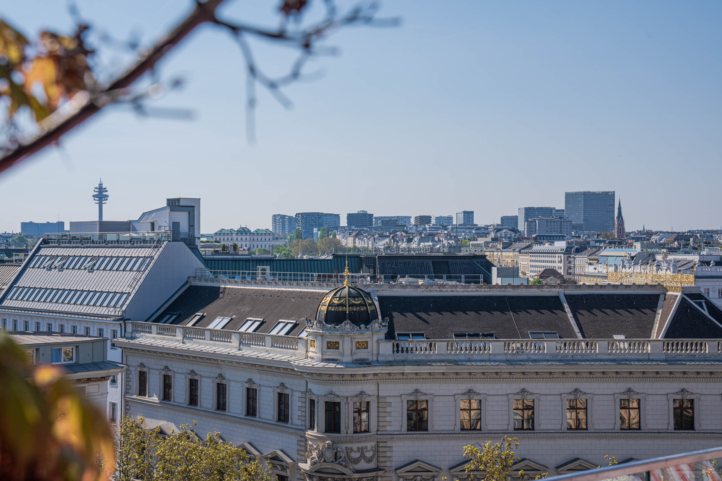 View over the rooftops of Vienna from Grand Ferdinand Hotel with Belvedere Palace in the distance