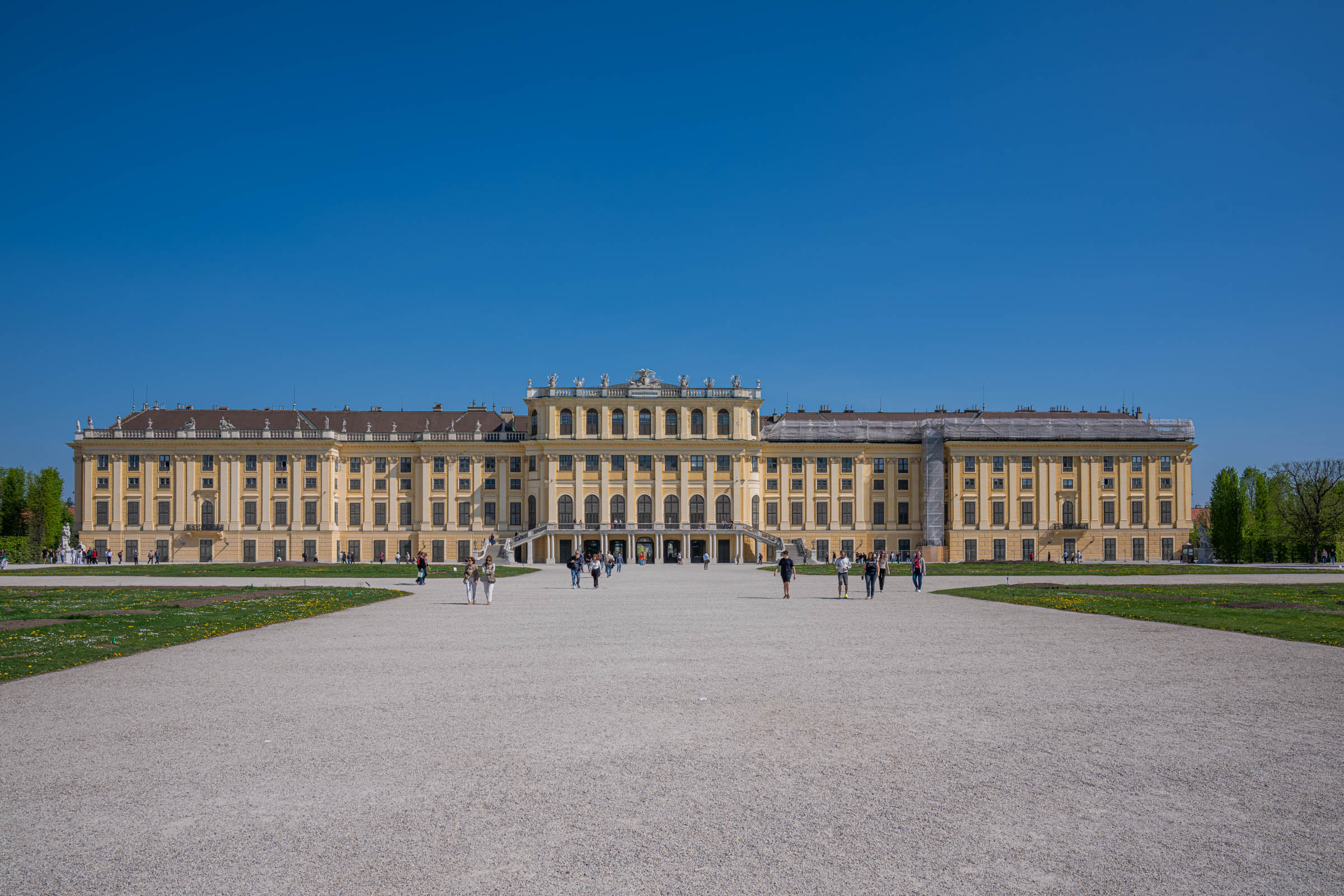 Garden facade of Schönbrunn Palace, Vienna's UNESCO-listed imperial summer residence, in golden light