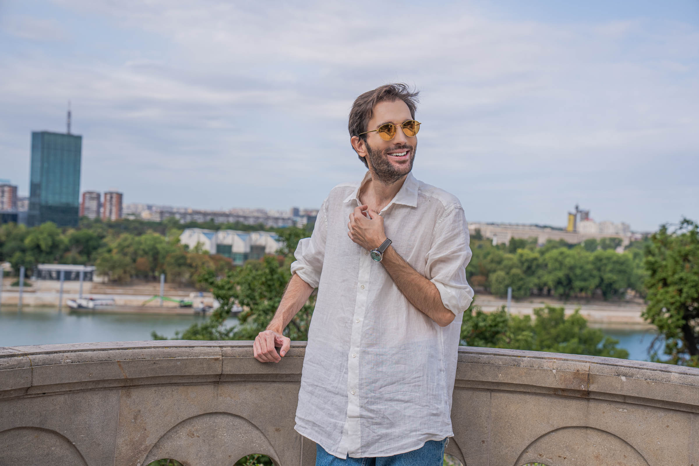 Valentino summer outfit against the New Belgrade skyline, worn by Marko Tadić
