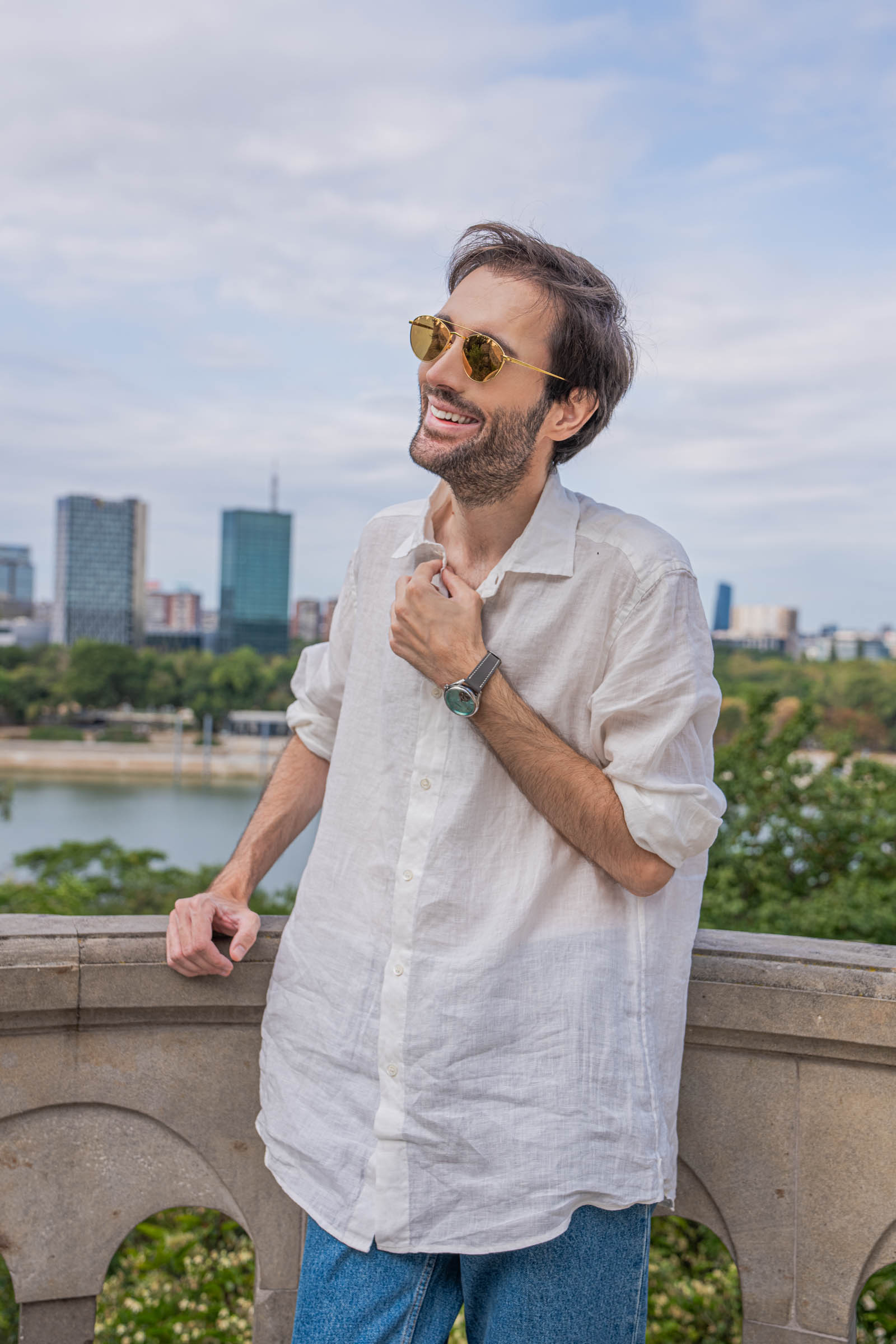 Marko Tadić leaning on the arched belvedere balustrade above the Sava in Valentino