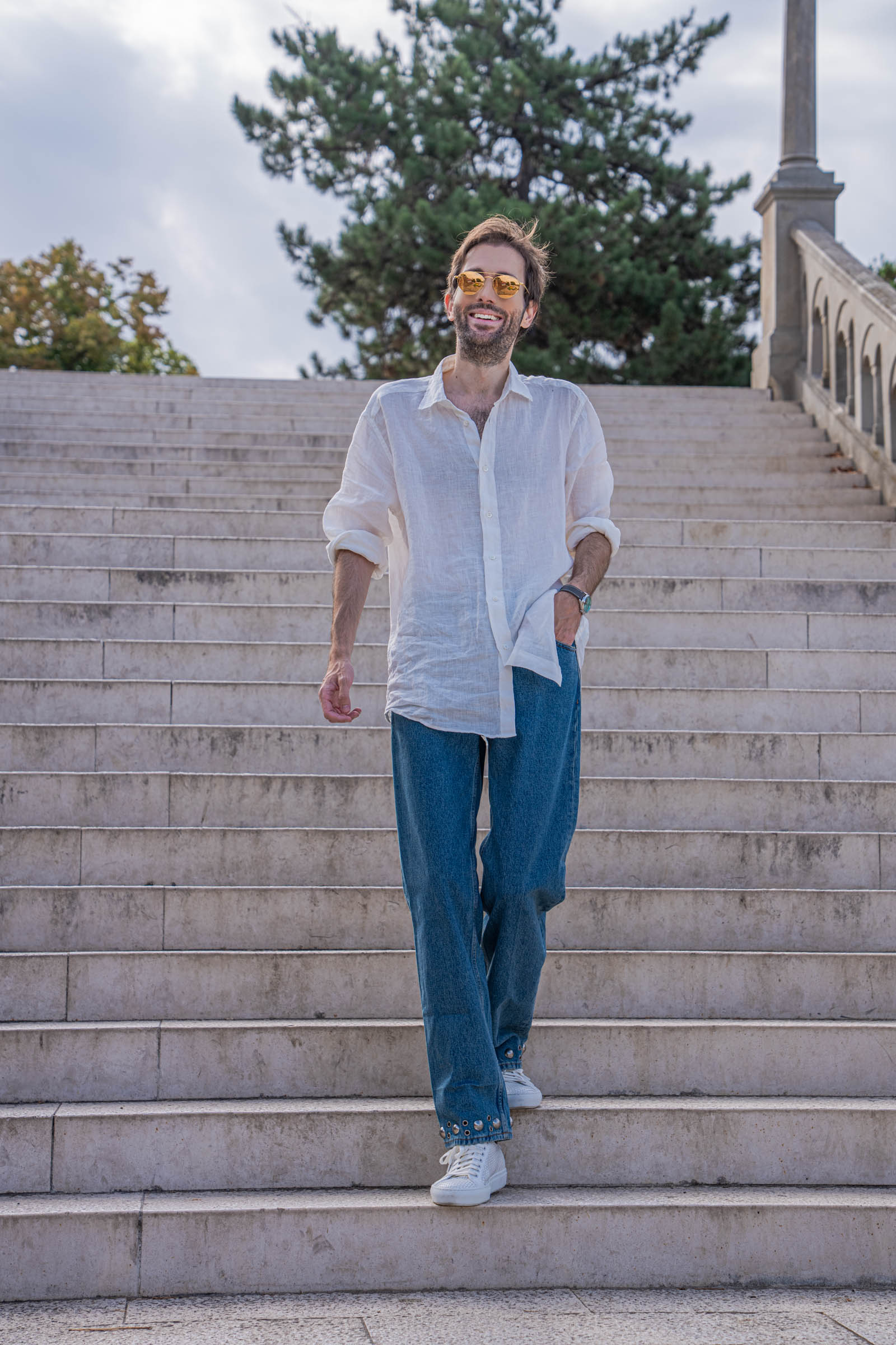 Marko Tadić descending the Kalemegdan staircase in a full Valentino summer outfit